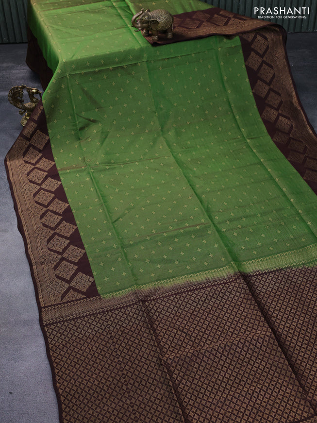 Kanchipuram soft silk saree light green and brown with allover zari weaves and zari woven border