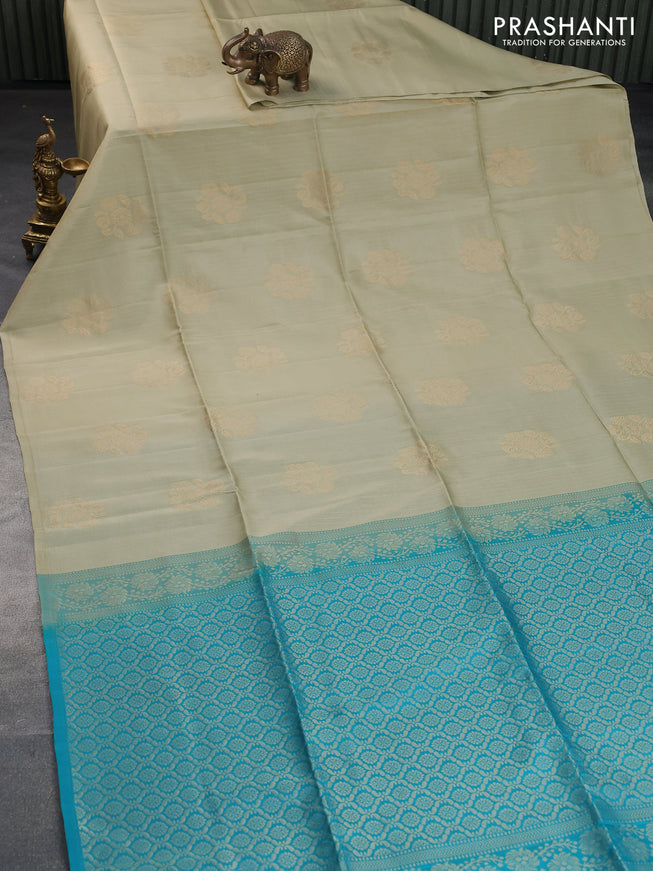 Kanchipuram soft silk saree pastel green and teal blue with allover zari weaves & buttas in borderless style