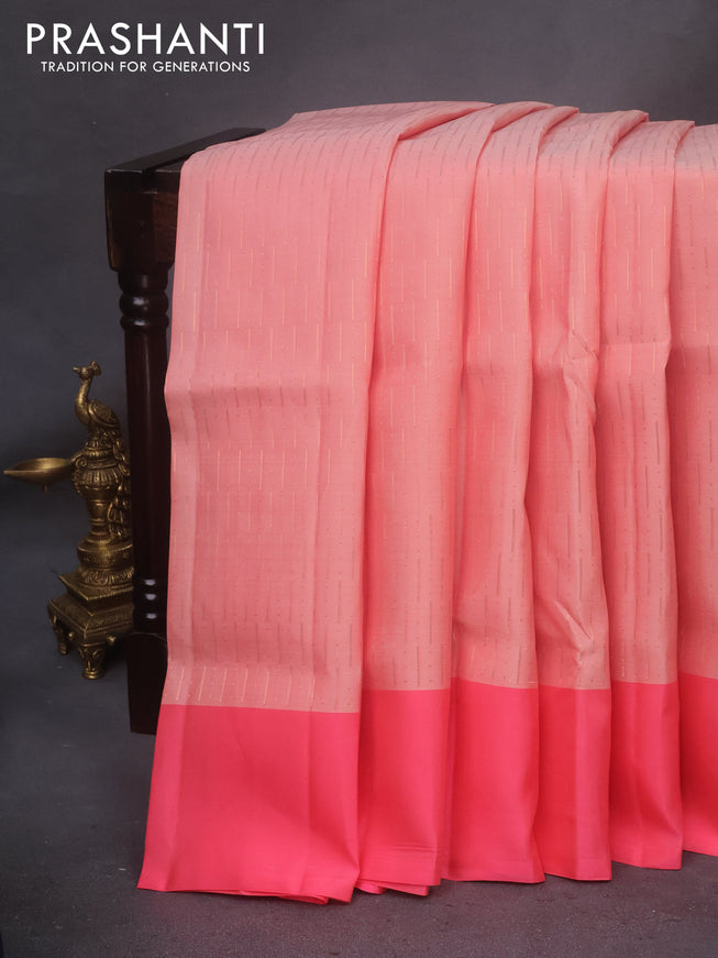 Kanchipuram soft silk saree peach shade and peach pink with allover zari weaves and simple border