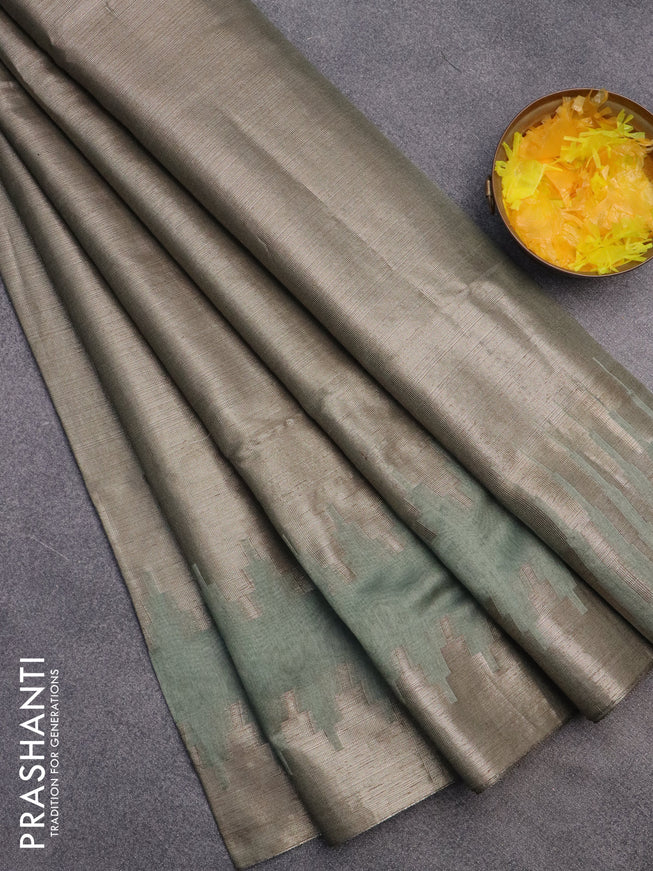 Banarasi matka tissue saree pastel green with plain body and long temple design zari woven border