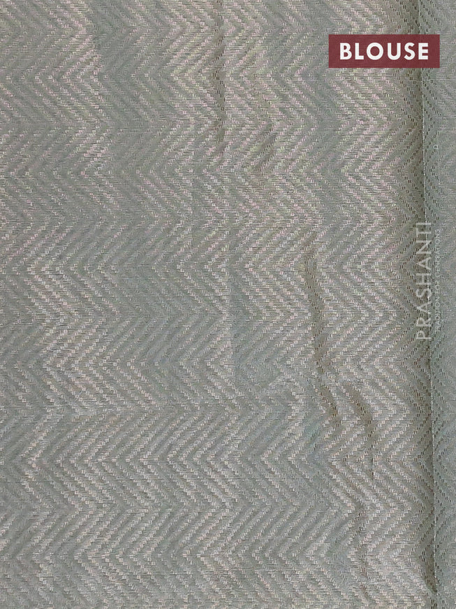 Banarasi matka tissue saree pastel green with plain body and long temple design zari woven border