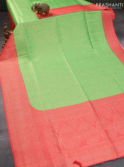 Banarasi softy silk saree light green and red with allover silver zari woven brocade weaves and silver zari woven border