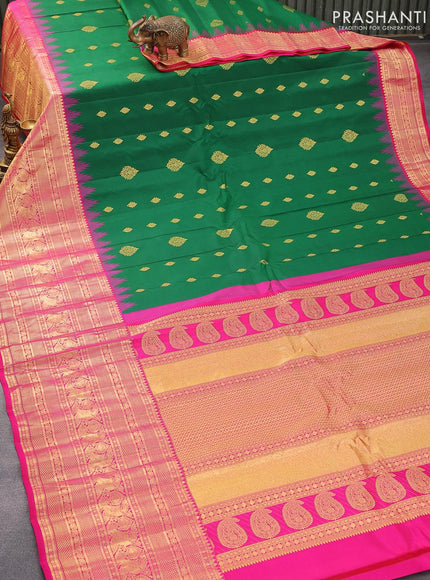 Pure gadwal silk saree green and pink with zari woven buttas and temple design long zari woven border