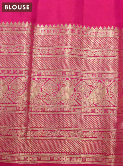 Pure gadwal silk saree green and pink with zari woven buttas and temple design long zari woven border