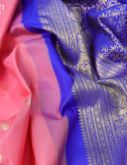 Pure gadwal silk saree peach pink and blue with zari woven buttas and temple design long zari woven border