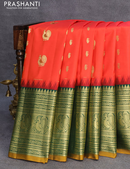 Pure gadwal silk saree orange and green with zari woven buttas and temple design long zari woven border