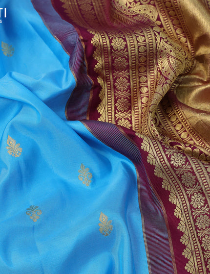 Pure gadwal silk saree light blue and dark magenta pink with zari woven buttas and zari woven border