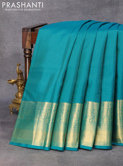 Pure kanjivaram silk saree teal blue and purple with allover zari weaves and long zari woven border & Allover wevaes