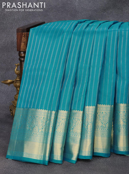 Pure kanjivaram silk saree blue and deep purple with allover zari weaves and zari woven border & Allover weaves