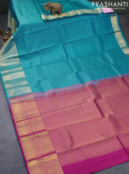 Pure kanjivaram silk saree blue and deep purple with allover zari weaves and zari woven border & Allover weaves