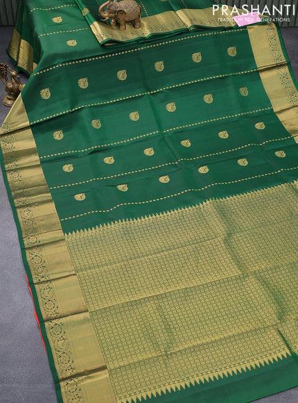 Pure kanjivaram silk saree green and dual shade of pinkish orange with annam zari woven buttas and zari woven border & Butta style