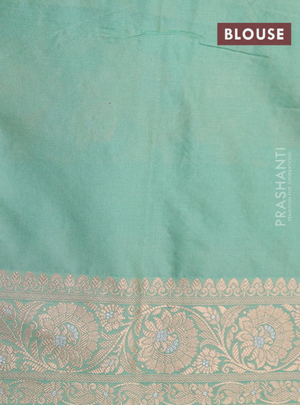 Banarasi uppada silk saree pastel green shade with allover floral zari woven brocade weaves and rich floral zari woven border