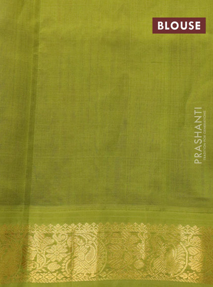 Silk cotton saree pink and mehendi green with allover floral prints and zari woven border