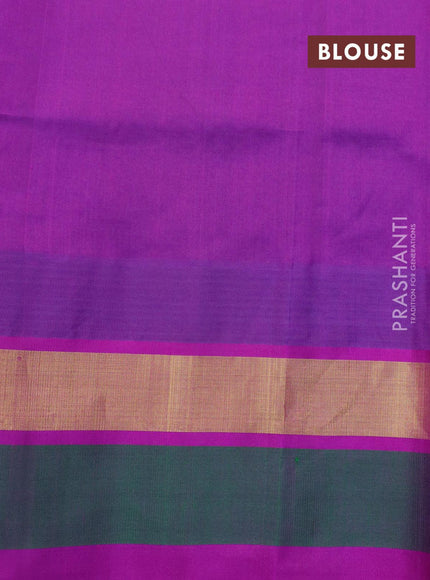 Silk cotton saree teal blue and purple with allover prints and temple design zari woven simple border