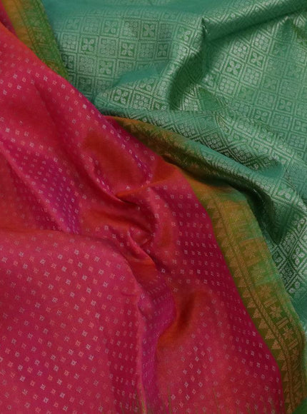 Pure soft silk saree dual shade of pinkish orange and green with allover silver & copper zari weaves and zari woven simple border