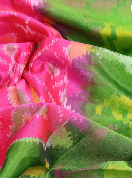 Ikat soft silk saree pink and green with allover ikat weaves and zari woven border