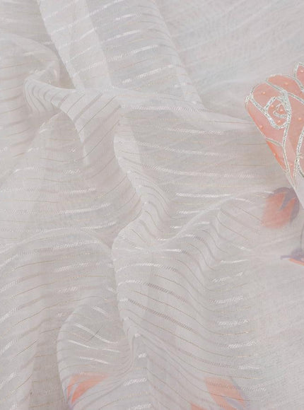 Pure organza silk saree off white with allover silver zari stripes pattern and floral design beaded work border