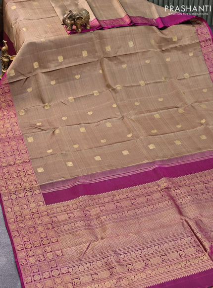 Pure kanjivaram silk saree chikku shade and dark magenta pink with annam & paisley zari woven buttas and zari woven border