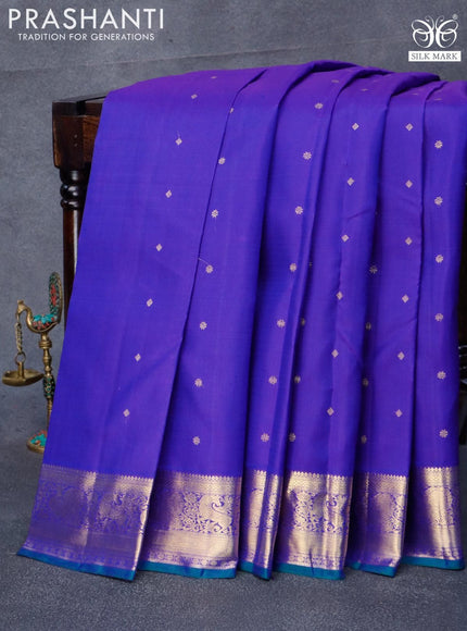 Pure kanjivaram silk saree blue and green with allover zari woven buttas and annam zari woven border