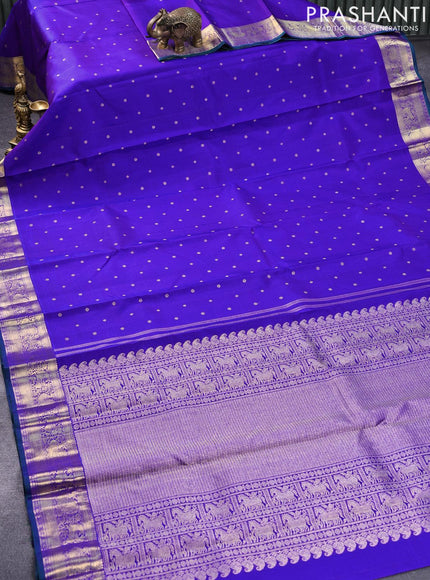 Pure kanjivaram silk saree blue and green with allover zari woven buttas and annam zari woven border