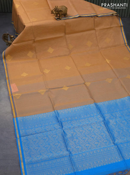 Kora silk cotton saree sandal and cs blue with zari woven buttas and zari woven piping border