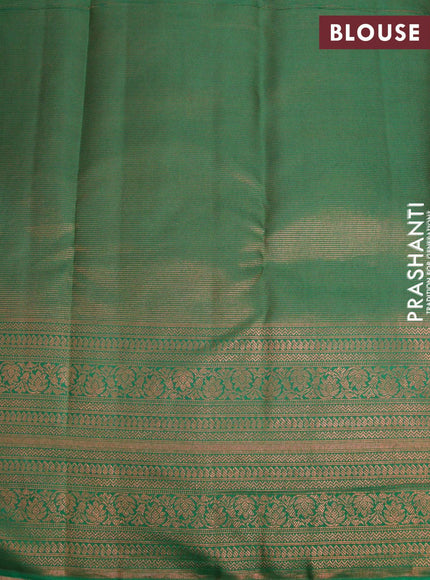 Pure kanjivaram silk saree pastel pink and green with allover floral digital prints & copper zari weaves and long zari woven border