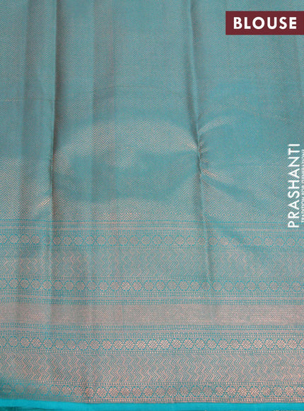 Pure kanjivaram silk saree brown and teal green with allover floral digital prints & zari weaves and long zari woven border