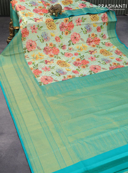 Pure kanjivaram silk saree pastel blue and teal green with allover floral digital prints & zari weaves and long zari woven border