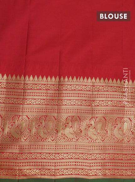 Pure gadwal silk saree light blue and red with allover zari woven buttas and temple design long annam zari woven border