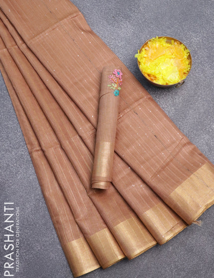 Semi tussar saree pastel brown with allover zari woven stripes pattern and sequin work pallu & embroidery work blouse