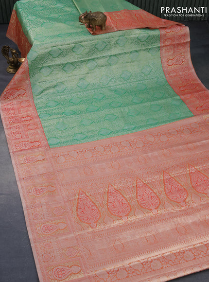 Tissue semi kanjivaram silk saree green and red with allover silver zari woven broacde weaves and silver zari woven border