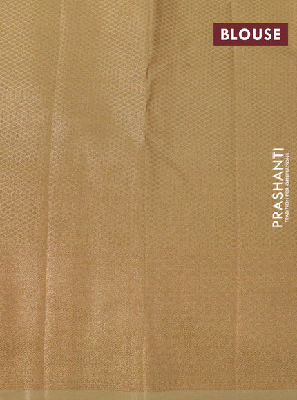 Tissue semi kanjivaram silk saree pale yellow with allover zari woven brocade weaves and temple design zari woven border