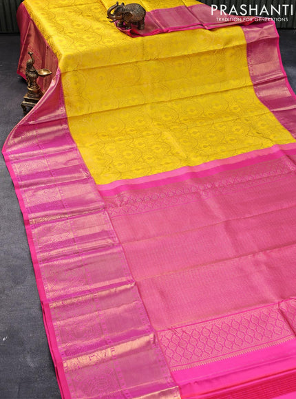 Pure kanjivaram silk saree yellow and pink with allover zari woven brocade weaves and long zari woven annam border