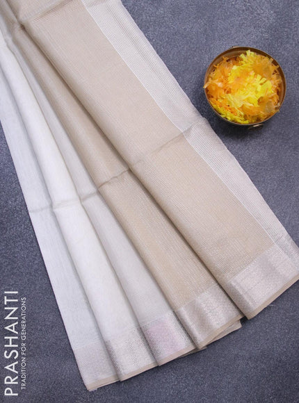 Maheshwari silk cotton saree off white and beige with allover stripes pattern and zari woven border