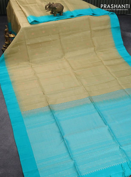 Pure soft silk saree elaichi green shade and teal blue with allover silver & copper zari buttas and simple border