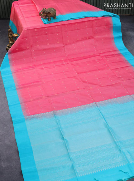 Pure soft silk saree peach pink and teal blue with allover silver & copper zari buttas and simple border