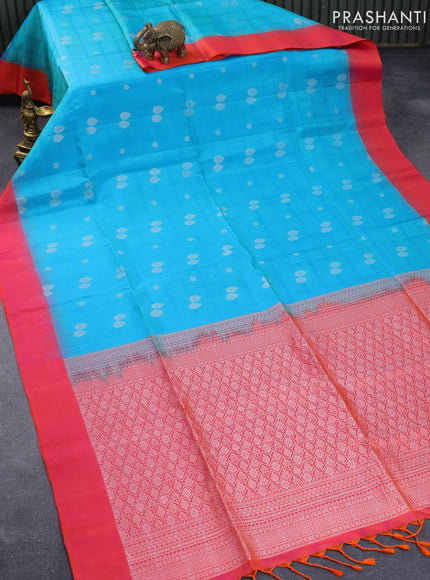 Pure soft silk saree teal blue and dual shade of pinkish orange with silver zari woven butta weaves and simple border