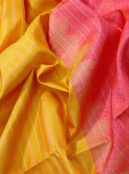 Pure soft silk saree mango yellow and dual shade od pinkish orange with allover silver & copper zari weaves and silver & copper zari woven butta border