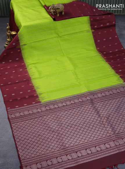 Pure soft silk saree light green and deep maroon with allover silver & copper zari weaves and long silver & copper zari woven butta border