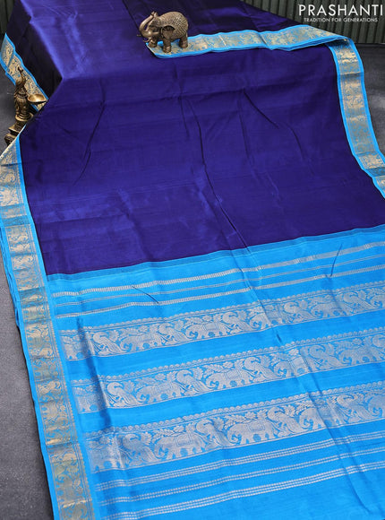 10 yards silk cotton saree blue and cs blue with plain body and elephant & peacock zari woven border without blouse