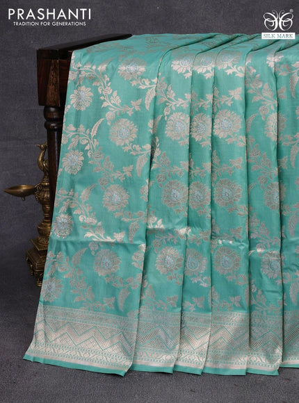 Pure banarasi uppada silk saree pastel blue with allover zari woven floral weaves and zari woven border