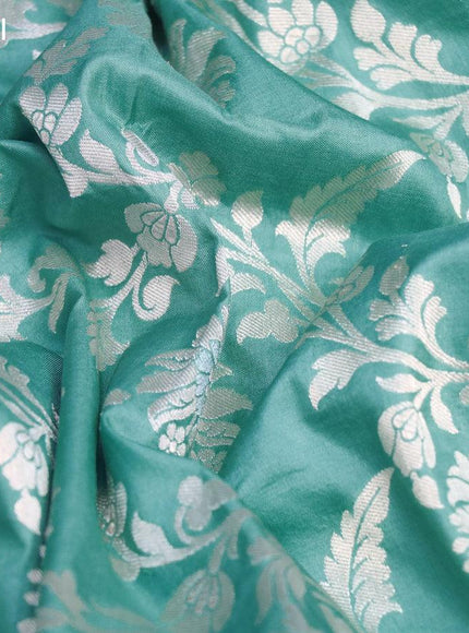 Pure banarasi uppada silk saree pastel blue with allover zari woven floral weaves and zari woven border