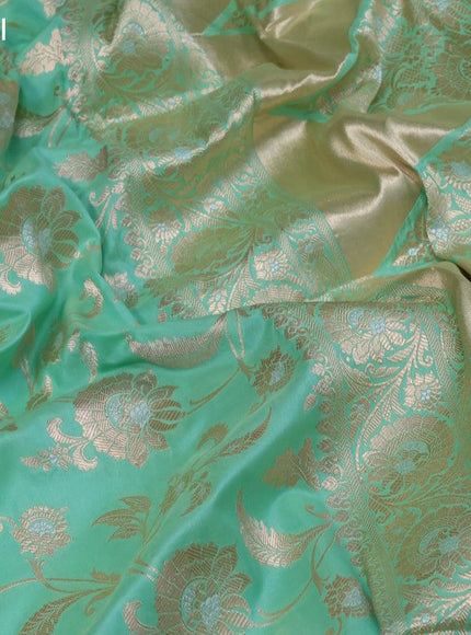 Pure banarasi uppada silk saree pastel green with allover zari woven floral weaves and zari woven border