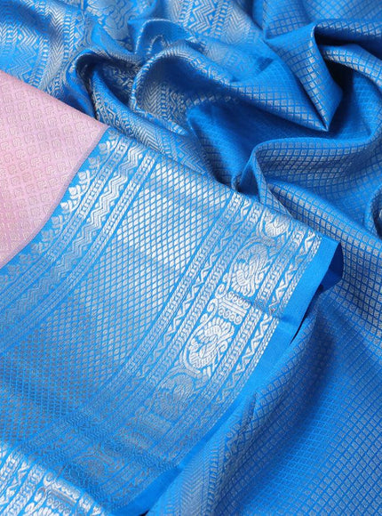 Pure kanjivaram silk saree light pink and cs blue with allover silver zari woven brocade weaves and silver zari woven border