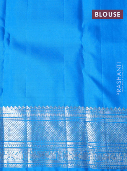 Pure kanjivaram silk saree light pink and cs blue with allover silver zari woven brocade weaves and silver zari woven border