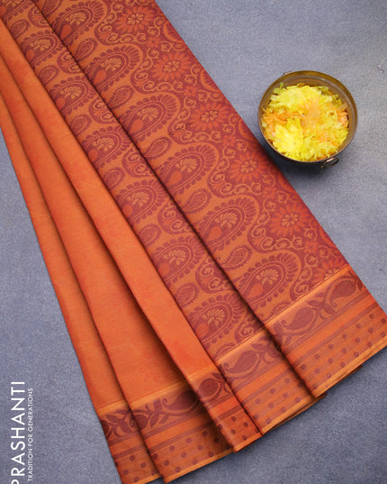 Coimbatore cotton saree dual shade of sunset orange with allover self emboss and thread woven border