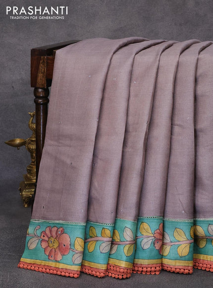 Pure tussar silk saree grey shade and teal green with allover mirror work and kalamkari printed border