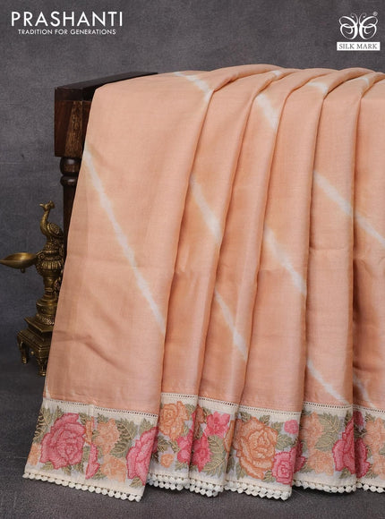 Pure tussar silk saree peach shade and cream with tie & dye prints and floral design embroidery work border