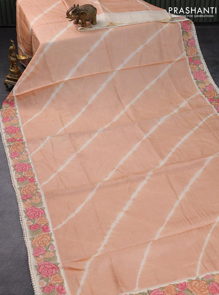 Pure tussar silk saree peach shade and cream with tie & dye prints and floral design embroidery work border