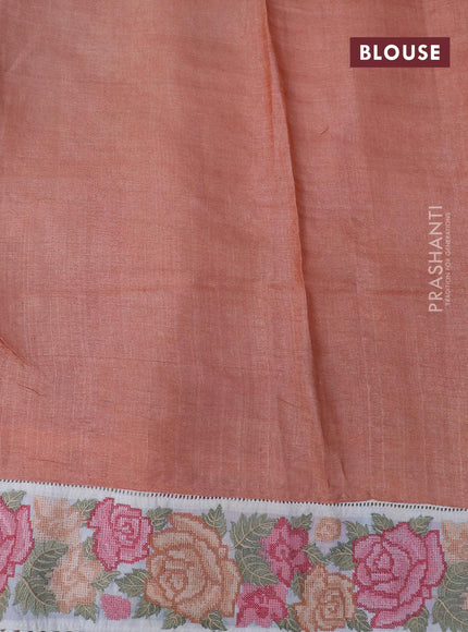 Pure tussar silk saree peach orange and cream with tie & dye prints and floral design embroidery work border